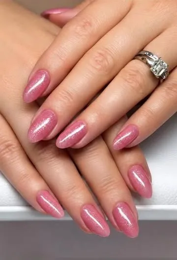 Rose gel with fine shimmer on almond nails